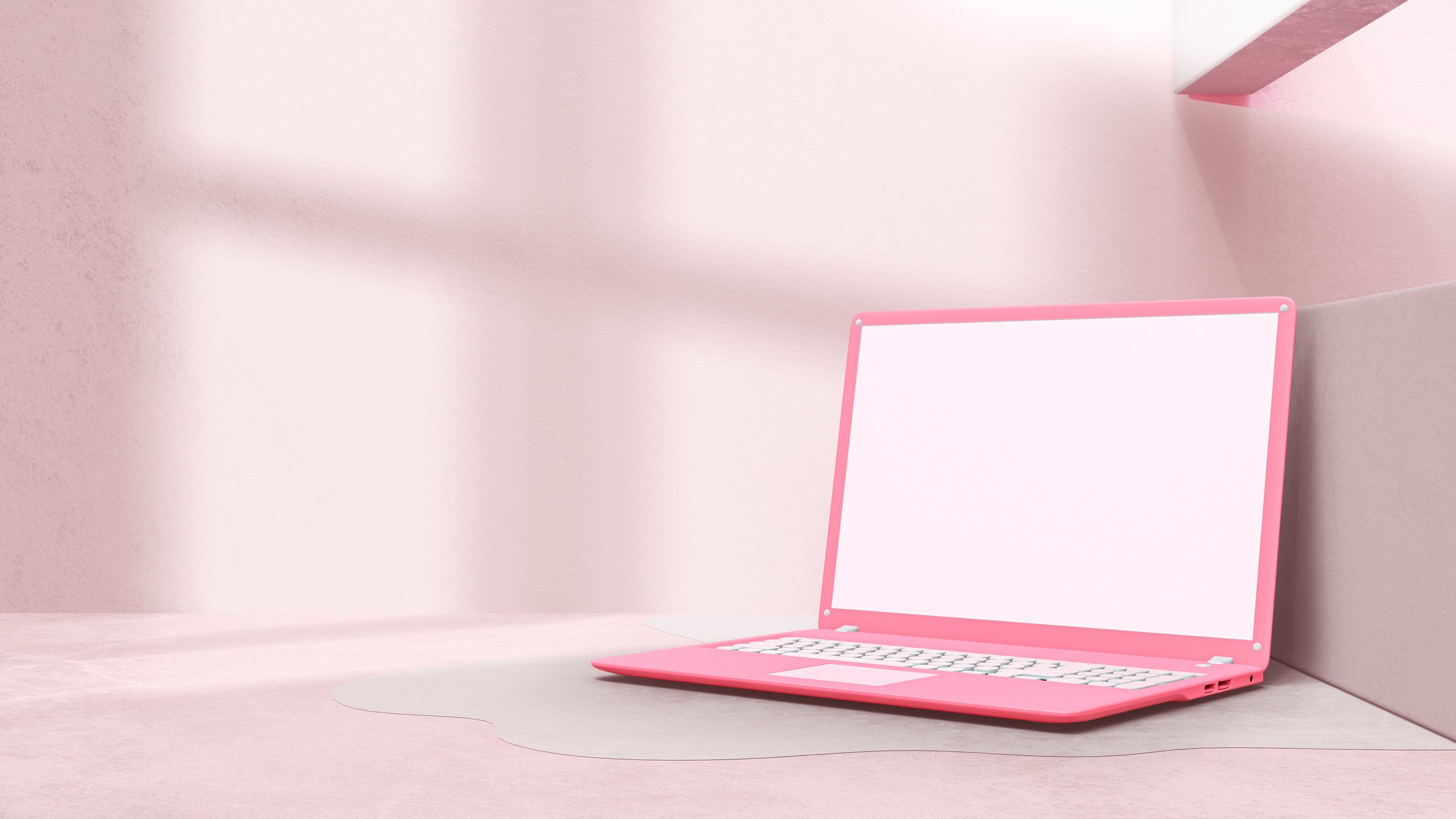 Pink laptop with decoration minimal. Shadow from window on c